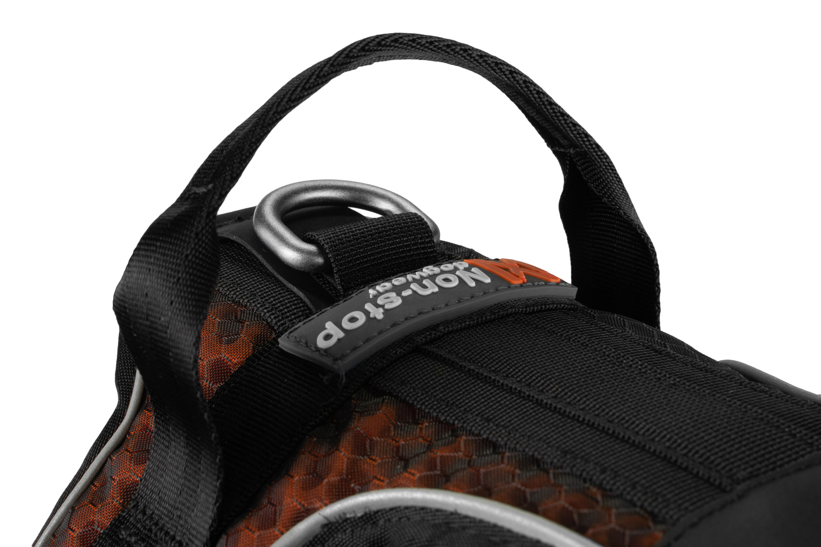 Detailshot van het Rock harnas van Non-stop Dogwear, met focus op de handgreep en aluminium D-ring.